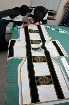Fixing the bottom of the Dalmatic