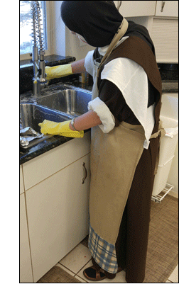 Sister cleaning out sink