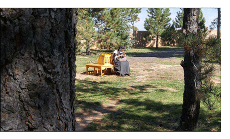 Sister enjoys some solitude outside