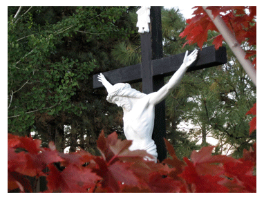 Our outside crucifix surrounded by fall colors